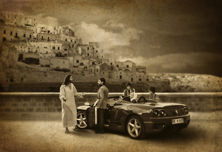 Jesus talking to a man getting into a modern red sports car (Ferrari) with two passengers, set against the backdrop of an ancient hillside town.